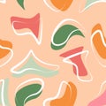 Abstract seamless pattern of colored organic shapes spots and white brush stroke outlines, autumn leaves colors