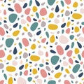 Abstract seamless pattern with colorful pebbles on white. Bright stone mosaic terazzo background Royalty Free Stock Photo