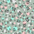 Abstract seamless pattern with repeated colored round dots and spots.