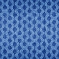 Abstract seamless pattern. Repeating fades blue denim background prints. Repeated faded distress circle jean fabric. Chambray