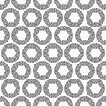 Abstract seamless pattern of repeating round striped circular ornaments