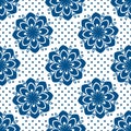 Abstract seamless pattern with stylized blue flowers on a white background. Royalty Free Stock Photo