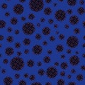 Abstract seamless pattern with textural black different balls on blue.