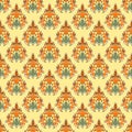 Abstract seamless wallpaper in the style of damask. Curly elements in yellow, orange and green colors