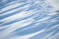 Abstract shadow and light patterns in snow Royalty Free Stock Photo