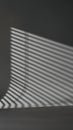 Abstract Shadow Pattern Created by Window Blinds on Wall Royalty Free Stock Photo