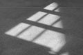 Shadow of the window in morning light on cement floor background Royalty Free Stock Photo