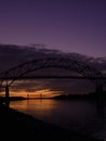 Sunset with Dramatic Clouds over the Borne Bridge at the Cape Cod Canal Royalty Free Stock Photo