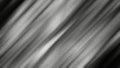 Abstract shimmering colorful stripes on a black background. Motion. Anime like blurred diagonal stripes or light beams.