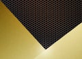 Abstract Shiny Brushed Gold on Golden Hexagonal Metal Mesh Background