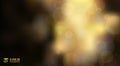 Abstract shiny defocused gold bokeh lights on black background Royalty Free Stock Photo