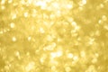 Abstract shiny glitter christmas or new year background. Light Gold glitter background with sparkling texture. Golden shimmering Royalty Free Stock Photo