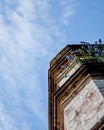 Abstract shot on old abandoned church with flowers on the ledge Royalty Free Stock Photo