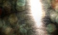 Abstract shot of sunlight reflections on the water and lens flare bokeh Royalty Free Stock Photo