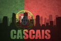 Abstract silhouette of the city with text Cascais at the vintage portuguese flag