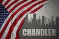 Abstract silhouette of the city with text Chandler near waving national flag of united states of america on a gray background