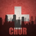 Abstract silhouette of the city with text Chur at the vintage swiss flag Royalty Free Stock Photo