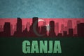 Abstract silhouette of the city with text Ganja at the vintage azerbaijan flag Royalty Free Stock Photo