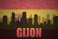 Abstract silhouette of the city with text Gijon at the vintage spanish flag