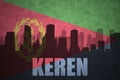 Abstract silhouette of the city with text Keren at the vintage eritrean flag