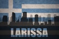 Abstract silhouette of the city with text Larissa at the vintage greece flag