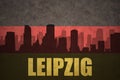 Abstract silhouette of the city with text Leipzig at the vintage german flag