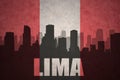 Abstract silhouette of the city with text Lima at the vintage peruvian flag