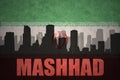 Abstract silhouette of the city with text Mashhad at the vintage iranian flag