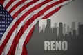 Abstract silhouette of the city with text Reno near waving national flag of united states of america on a gray background. 3D