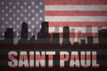 Abstract silhouette of the city with text Saint Paul at the vintage american flag
