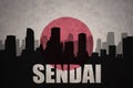 Abstract silhouette of the city with text Sendai at the vintage japanese flag