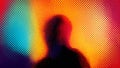 Abstract silhouette of a person against a vibrant rainbow color gradient background featuring a dynamic halftone dot pattern Royalty Free Stock Photo