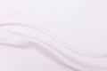 Abstract silky waving pink fabric background