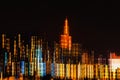 Abstract skyscrapers at night. Modern neon city, light bokeh, blurred focus, modern background Royalty Free Stock Photo