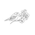 Abstract small bird perched on blooming tree branch Royalty Free Stock Photo