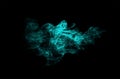 Abstract smoke cloud tiffany blue colored isolated on black background. Royalty Free Stock Photo