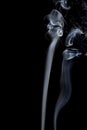 Abstract of smoke dance on a black background.