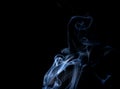 Abstract smoke of joss stickon black Royalty Free Stock Photo