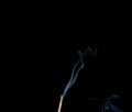 Smoke of joss stickon black background Royalty Free Stock Photo