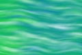 Neon green and blue artistic soft blurred wave water effect background Royalty Free Stock Photo