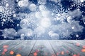 Abstract Snowy Christmas Background. Wooden Table With Defocused Lights Royalty Free Stock Photo