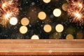 Abstract Snowy Christmas Background. Wooden Table With Defocused Lights. 3d illustration Royalty Free Stock Photo