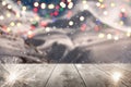 Abstract Snowy Christmas Background. Wooden Table With Defocused Lights and landscape. 3d illustration Royalty Free Stock Photo