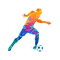 Abstract soccer player running with the ball from splash of watercolors