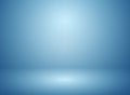 Abstract soft blur of gradient blue studio and wall background.