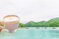 Abstract soft blurred and soft focus a cup of coffee,the raft,the swamp,the mountain beautiful sky and cloud at Huai Krathing, Lo