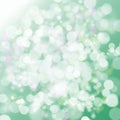 Beauty green and white sparkle bokeh. Abstract glowing light circle pattern background. blurry twinkle effect sky frame with bubbl Royalty Free Stock Photo