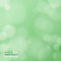 Abstract of soft bokeh pattern on gradient green background. Royalty Free Stock Photo