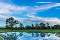 Abstract soft focus the silhouette of the sunset with the water,the plowing, tillage, picking, tillage, before planting, cultivati Royalty Free Stock Photo