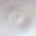 Abstract soft retro beige white background in ground colors and vortex or whirl effect, spiral circle wave